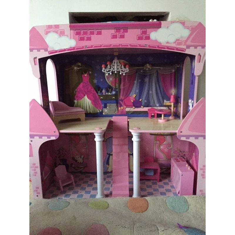 Large wooden dolls house