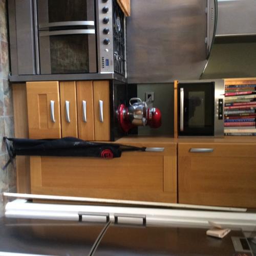 Oak door kitchen with black granite work tops