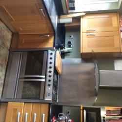 Oak door kitchen with black granite work tops