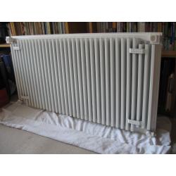 White radiator with grille cover