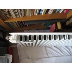 White radiator with grille cover