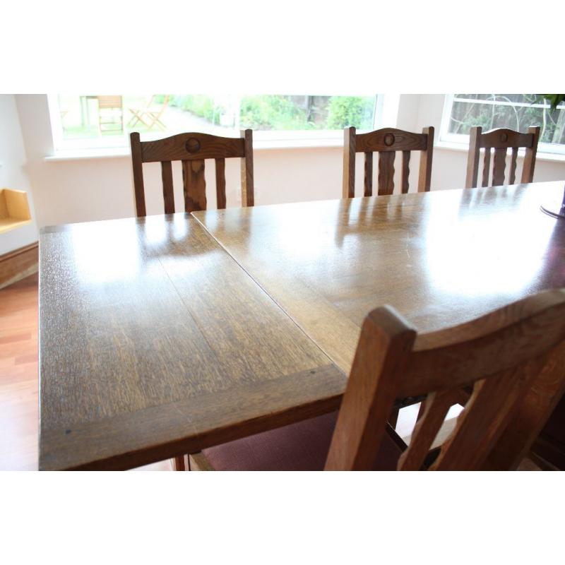 Oak dining table and six chairs