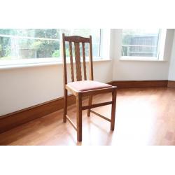 Oak dining table and six chairs