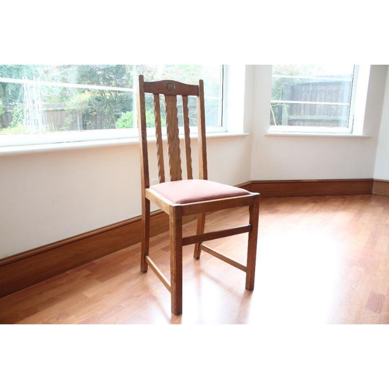 Oak dining table and six chairs