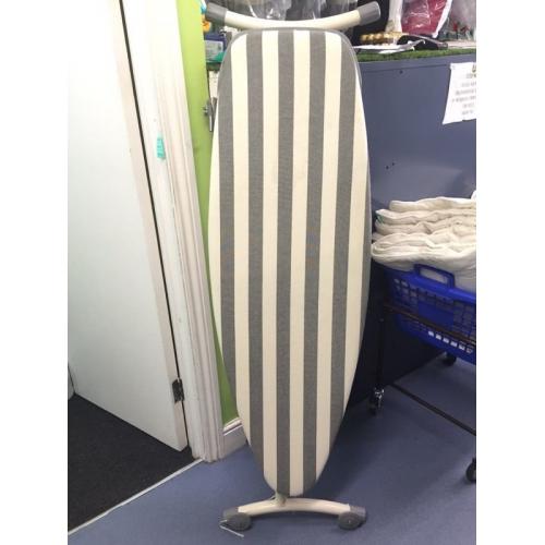Large ironing board for pressing clothes