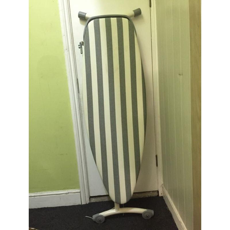 Large ironing board for pressing clothes