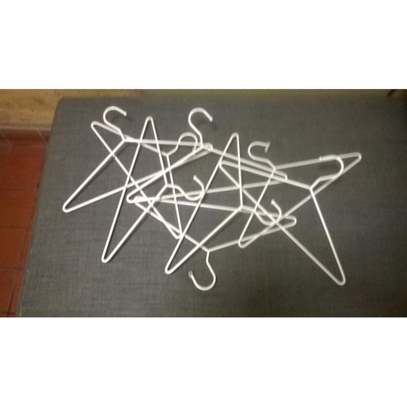 Clothes hanger cluster attaches to wall central London bargain