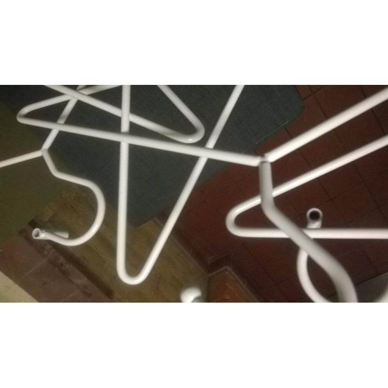 Clothes hanger cluster attaches to wall central London bargain