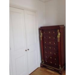 TWO red/chestnut drawer chests - identical with 7 drawers each