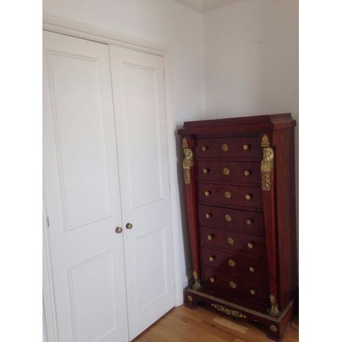 TWO red/chestnut drawer chests - identical with 7 drawers each