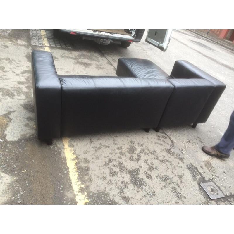 Black leather corner sofa. Can deliver!!