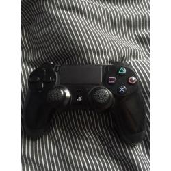 PlayStation 4 with 2 games and one controller