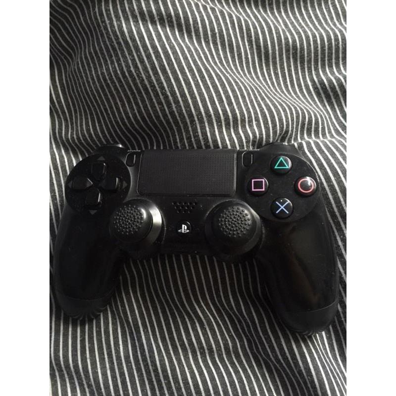PlayStation 4 with 2 games and one controller
