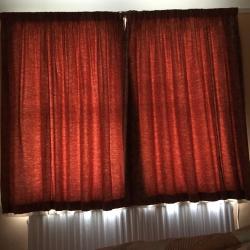 terracotta brick coloured curtains with jacquard goldy yellow flowers in a jacquard effect