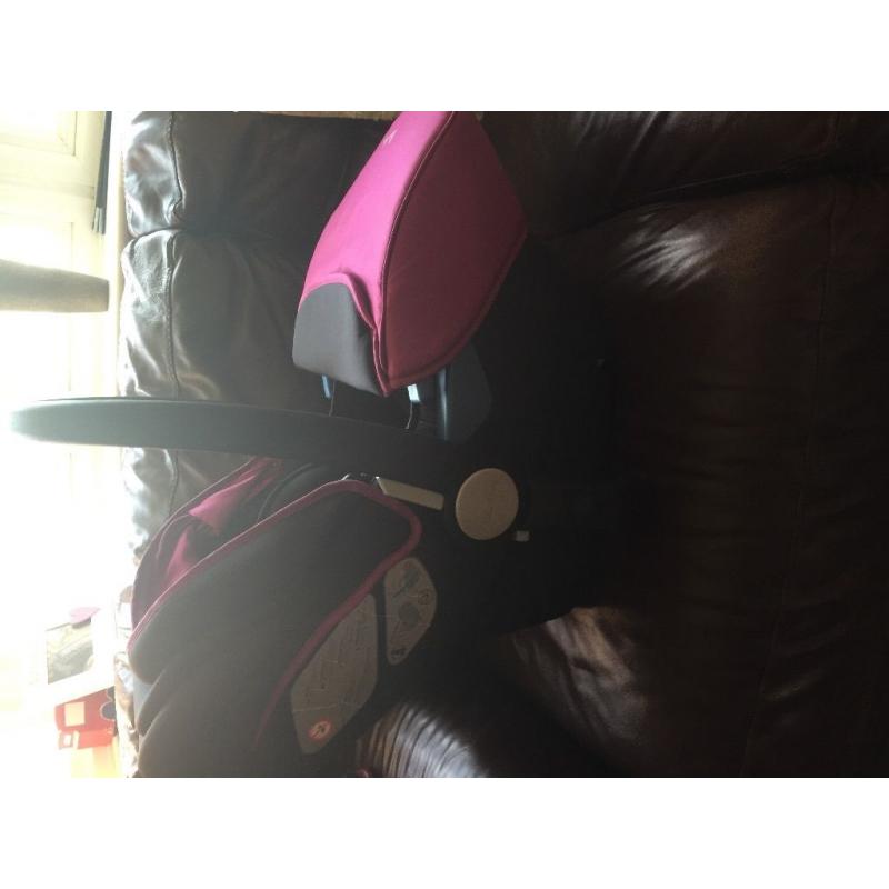 Silver cross new born car seat in raspberry.