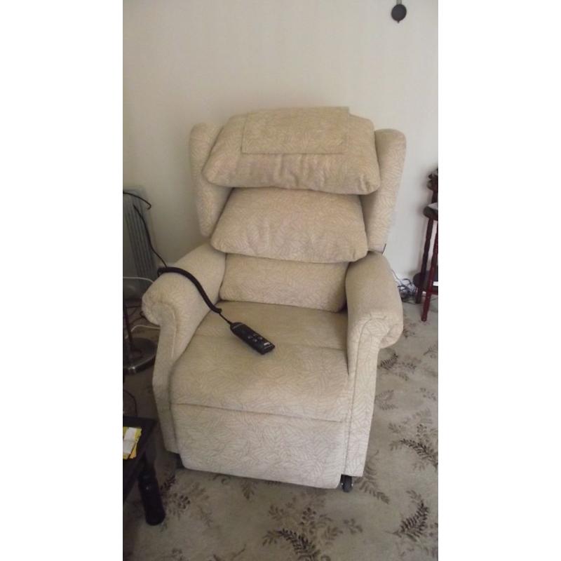 Armchair with recliner and riser action