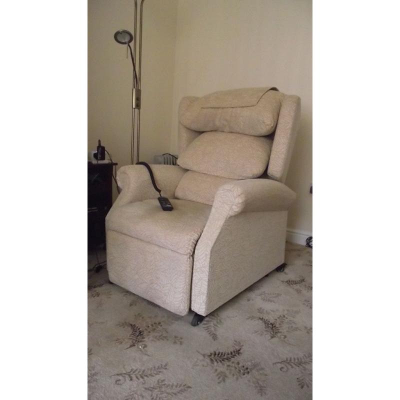 Armchair with recliner and riser action