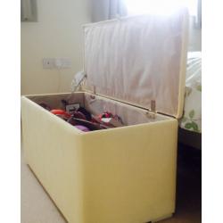 Pale yellow ottoman