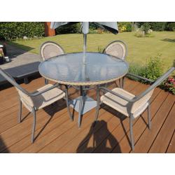 Patio table and four chairs for sale