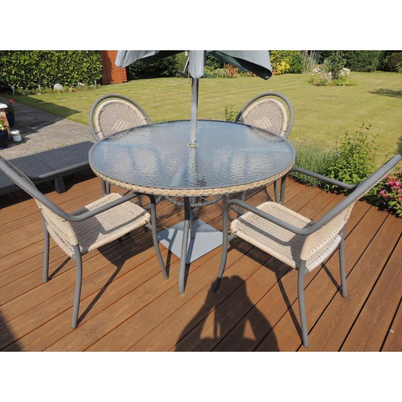 Patio table and four chairs for sale