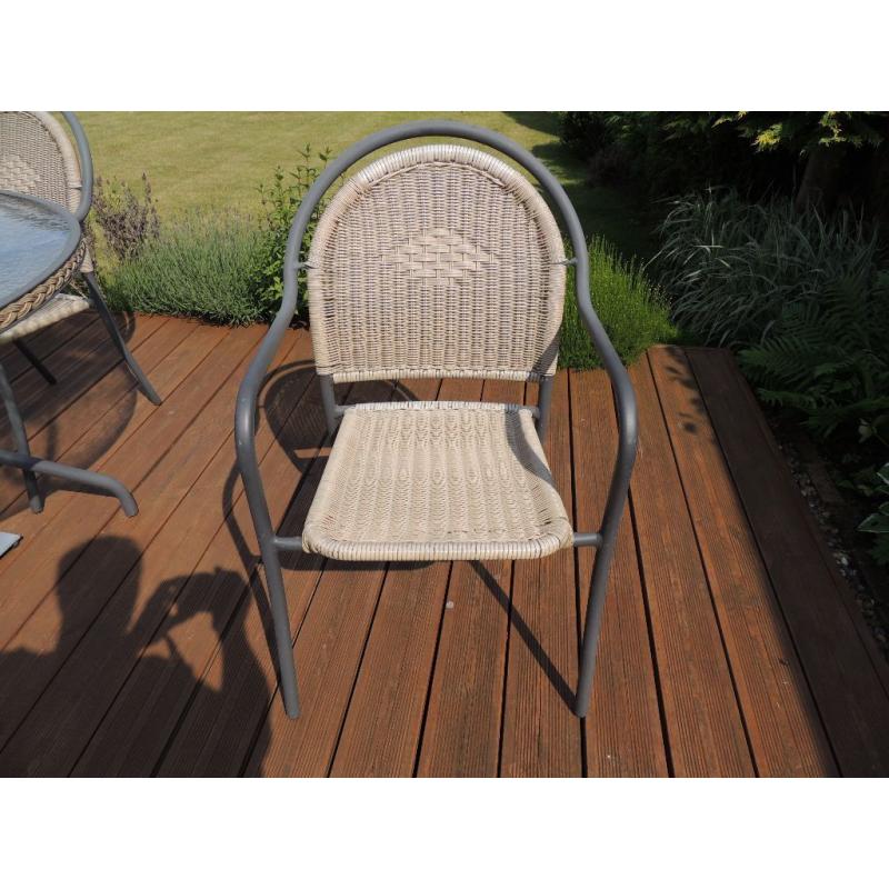 Patio table and four chairs for sale