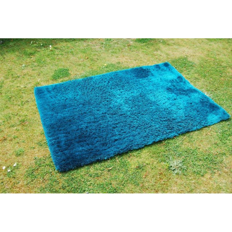 Large turquoise/green long pile oblong rug (60x40 inches)