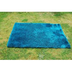 Large turquoise/green long pile oblong rug (60x40 inches)