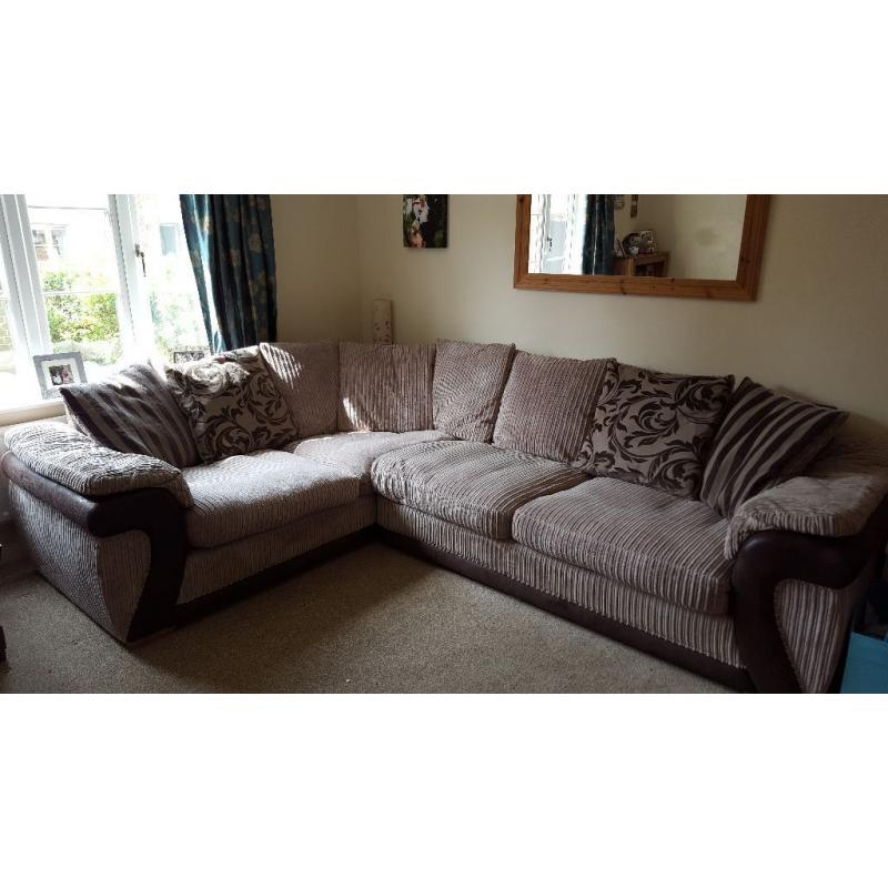 A luxury cream and brown corner sofa by DFS.