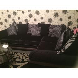 Black and silver grey corner sofa and chair