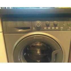 Silver Hotpoint washing machine.