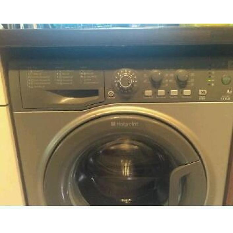 Silver Hotpoint washing machine.
