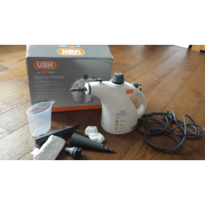 Hand held steamer