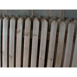 wooden fence and fence stakes