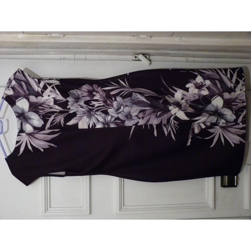 2 new dresses size 14/16