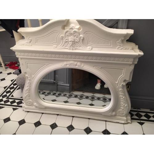 Plaster over mantel mirror
