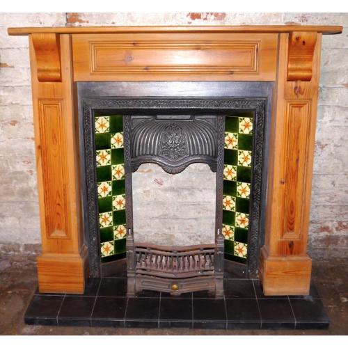Traditional fireplace with pine surround and slate hearth