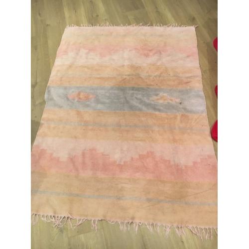 Thin soft rustic rug