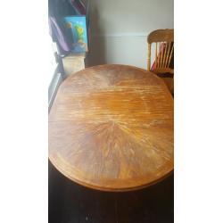 wooden dining table and 4 chairs