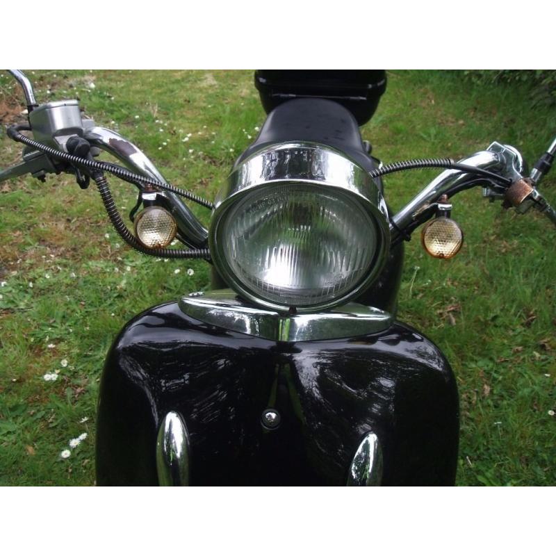 125 moped in black