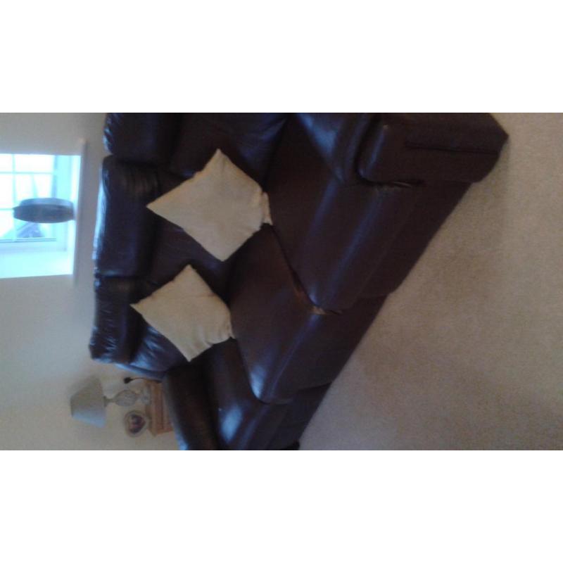 Brown leather reclining suite