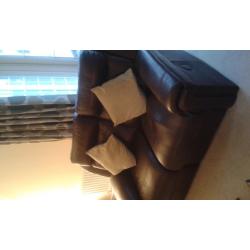 Brown leather reclining suite