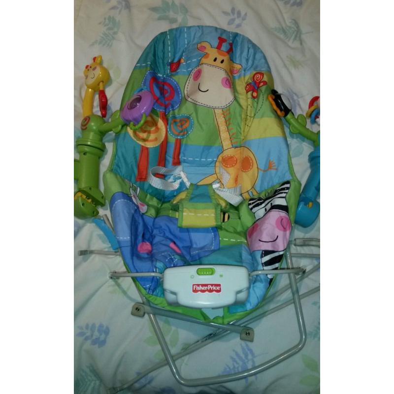 Fisher Price vibrating bouncy chair. Dual activity arms (rattle & music). VGC