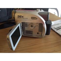 JVC digital video recorder with accessories.