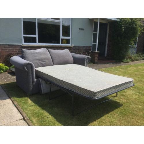 Chesterfield sofa bed - beech framed blue chenille with beech feet