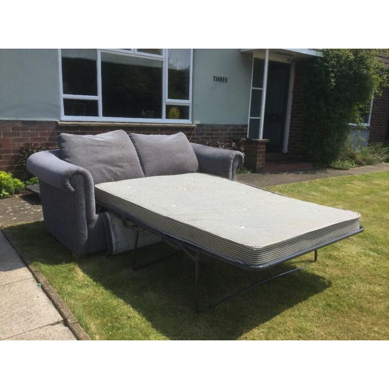 Chesterfield sofa bed - beech framed blue chenille with beech feet
