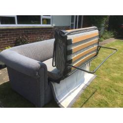 Chesterfield sofa bed - beech framed blue chenille with beech feet