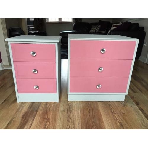 Pink and dove grey wooden drawers with stunning crystal handles.