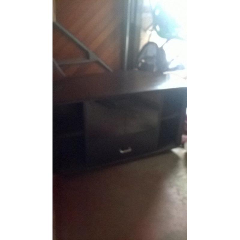 Black TV unit with glass door