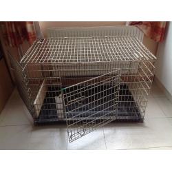 Very large dog crate. Will fit Lab, Goldie or other large dogs. Two doors, good condition.