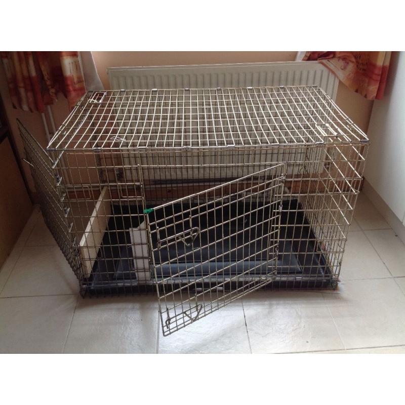 Very large dog crate. Will fit Lab, Goldie or other large dogs. Two doors, good condition.
